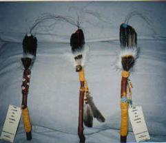 Talking sticks ( L' Eagle feather with Arbutus branch )  $200.00  beaded